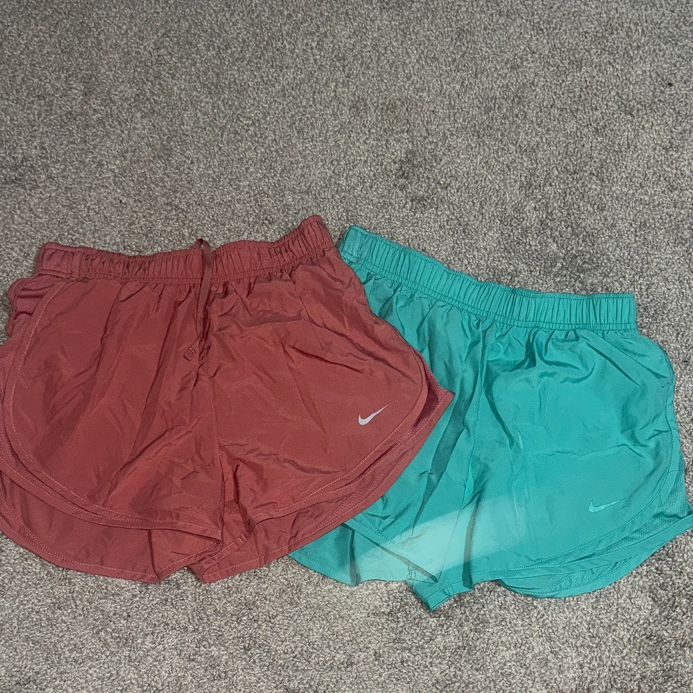Brand new size small Nike running shorts bundle